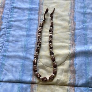 Chic Brown Pendant Necklace with Intricate Design